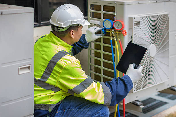 Professional Hvac technician working in University Park, MD